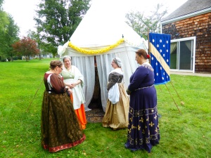 Vigil tent, with (from left to right): (the back of) Lady Vega, Mistress Briony, Mistress Filipia, and Mistress Antoinette